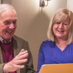 client and carer looking into healthcare funding