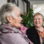 carer providing advice and support to their client