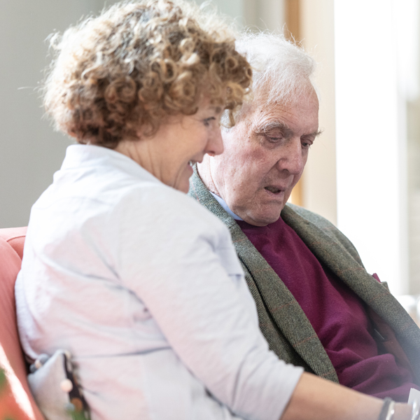 bedfordshire-live-care client and carer reading the care plan