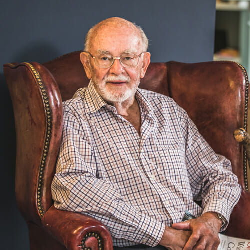 male home care client sitting in a chair