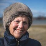 carer outside during winter