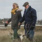 Live in carer and client taking a walk outside